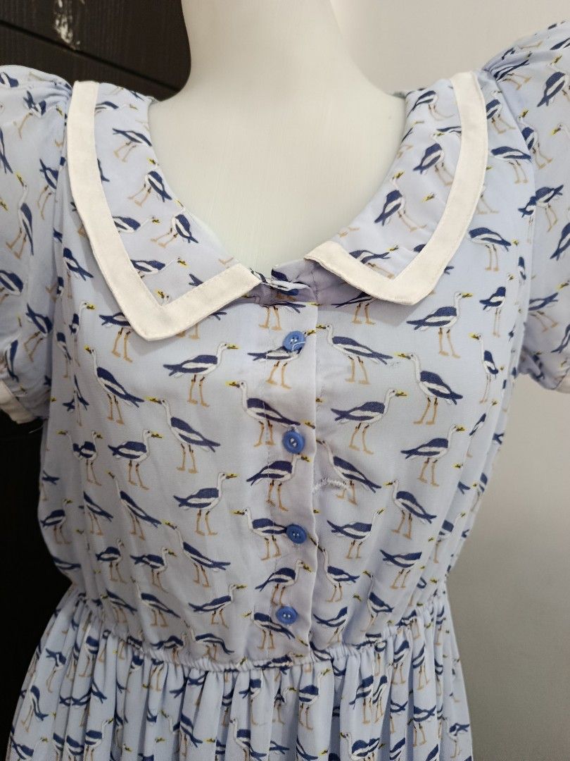 Light Blue Bird Print Peter Pan Collar Dress (Category: Dresses) located in Manila. Submitted by beckylafea (Listing ID 1451520568, Image 2). Description: - Adorable light blue dress - Fun all-over bird print - Classic Peter Pan collar - Comfortable short sleeves - Elasticated waist for a great fit - Easy button-up front - Ideal for casual outings.