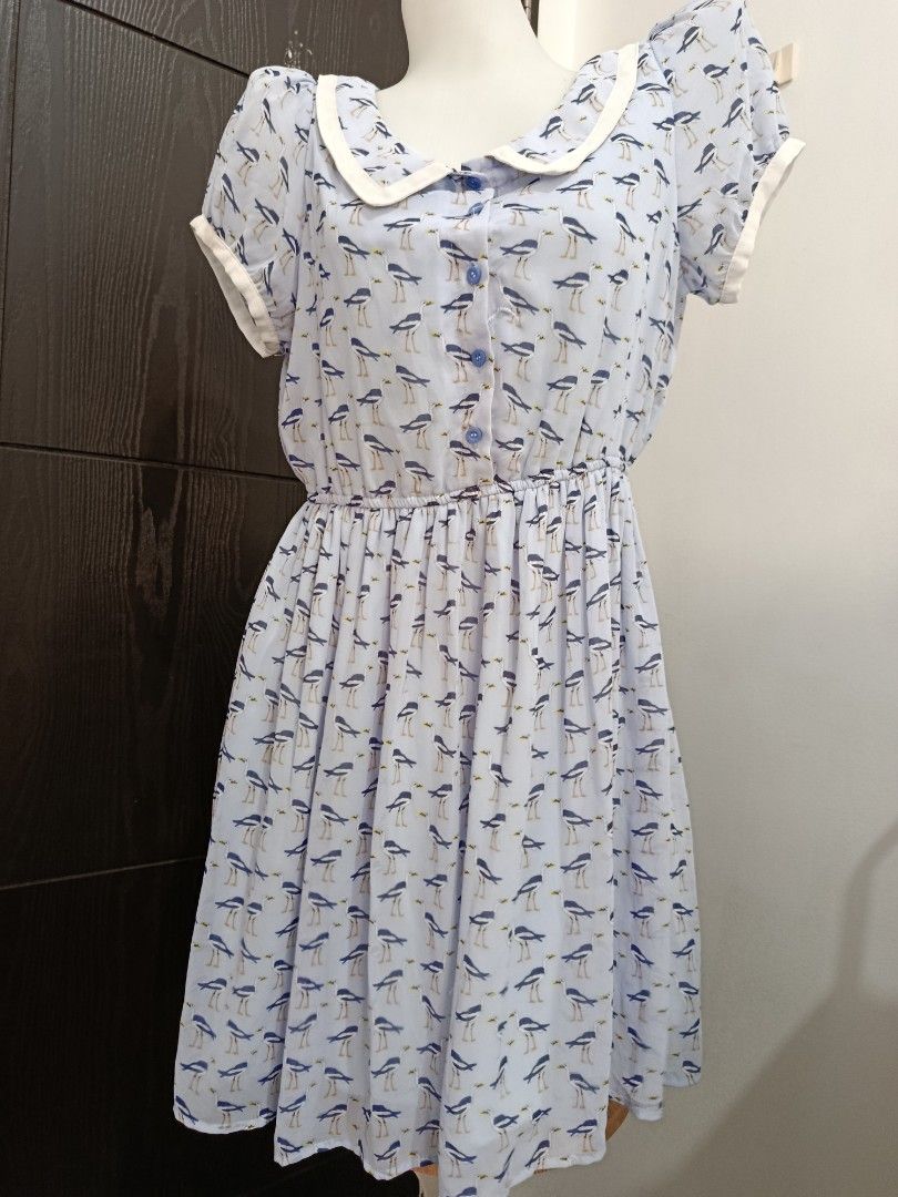 Light Blue Bird Print Peter Pan Collar Dress (Category: Dresses) located in Manila. Submitted by beckylafea (Listing ID 1451520568, Image 3). Description: - Adorable light blue dress - Fun all-over bird print - Classic Peter Pan collar - Comfortable short sleeves - Elasticated waist for a great fit - Easy button-up front - Ideal for casual outings.