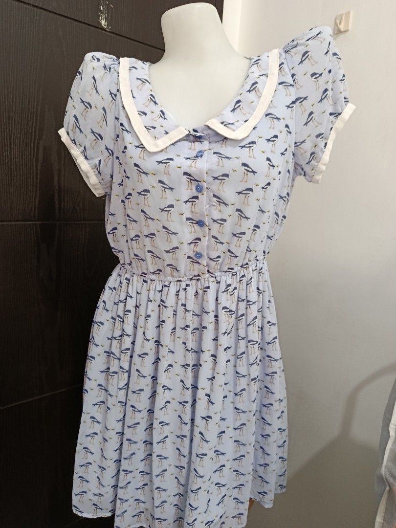 Light Blue Bird Print Peter Pan Collar Dress (Category: Dresses) located in Manila. Submitted by beckylafea (Listing ID 1451520568, Image 1). Description: - Adorable light blue dress - Fun all-over bird print - Classic Peter Pan collar - Comfortable short sleeves - Elasticated waist for a great fit - Easy button-up front - Ideal for casual outings.