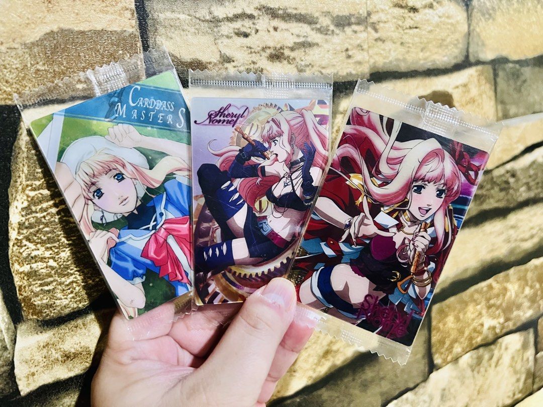 Macross Sealed Wafer Cards (Per pc/take all) (Category: Raw Singles) located in Taguig. Submitted by lae.onlineshop (Listing ID 1451560543, Image 2). Description: Macross Sealed Wafer Cards *THE COLOR MAY SLIGHTLY DIFFER FROM ACTUAL DUE TO LIGHTING AND/OR SCREEN RESOLUTION. Issue: minimal hairlines on outer plastic, AS IS OPEN FOR TAKE ALL‼️ PER PIECE: 80.00 ‼️1 DAY RESERVATION ONLY‼️ PLEASE DO LIMIT YOUR EXPECTATIONS. WHAT YOU SEE IS WHAT YOU GE