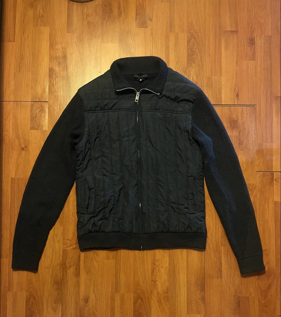 Magaschoni Man Hybrid Quilted Puffer Knit Jacket - Medium (Category: Coats, Jackets and Outerwear) located in Lipa City. Submitted by alexcollectionco (Listing ID 1451669779, Image 1). Description: Magaschoni Man full-zip hybrid cardigan jacket featuring a quilted insulated front panel with ribbed knit sleeves and back panel. Sleek, tactical-inspired design with a high stand collar and full front zip, perfect for gorpcore, quiet luxury, minimalis