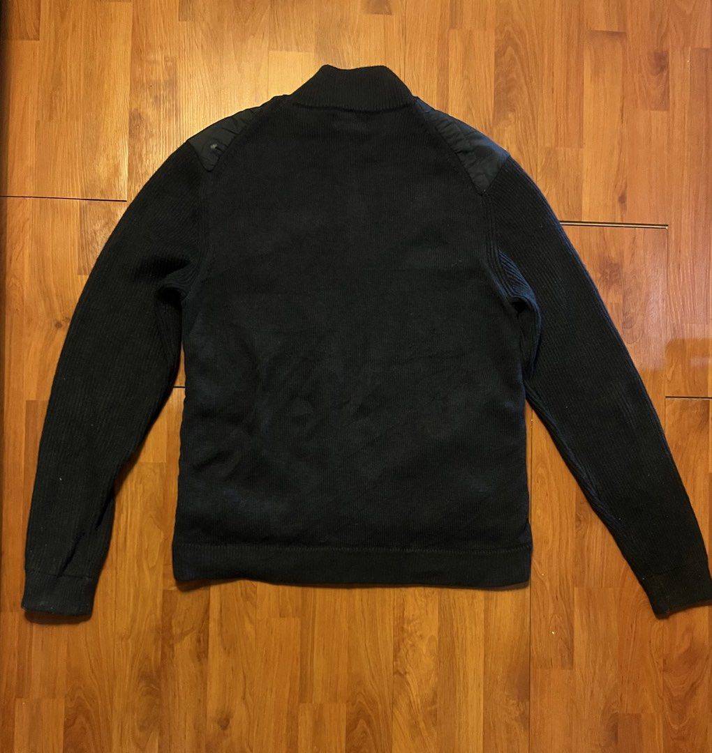 Magaschoni Man Hybrid Quilted Puffer Knit Jacket - Medium (Category: Coats, Jackets and Outerwear) located in Lipa City. Submitted by alexcollectionco (Listing ID 1451669779, Image 2). Description: Magaschoni Man full-zip hybrid cardigan jacket featuring a quilted insulated front panel with ribbed knit sleeves and back panel. Sleek, tactical-inspired design with a high stand collar and full front zip, perfect for gorpcore, quiet luxury, minimalis