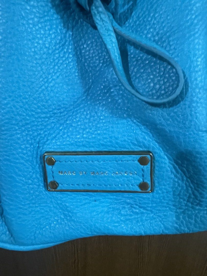 Marc Jacobs Blue Leather Bucket Bag (Category: Luxury Bags & Wallets) located in Manila. Submitted by misyeli (Listing ID 1451567198, Image 3). Description: - Brand: Marc by Marc Jacobs - Color: Blue - Material: Leather - Style: Bucket Bag - Closure: Drawstring - Hardware: Gold-tone - Interior: Small zip pocket - Use: Great for everyday - Sourced from a Thrift shop abroad, .