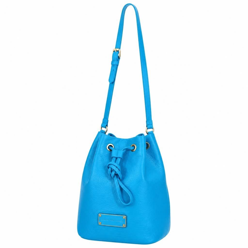 Marc Jacobs Blue Leather Bucket Bag (Category: Luxury Bags & Wallets) located in Manila. Submitted by misyeli (Listing ID 1451567198, Image 1). Description: - Brand: Marc by Marc Jacobs - Color: Blue - Material: Leather - Style: Bucket Bag - Closure: Drawstring - Hardware: Gold-tone - Interior: Small zip pocket - Use: Great for everyday - Sourced from a Thrift shop abroad, .
