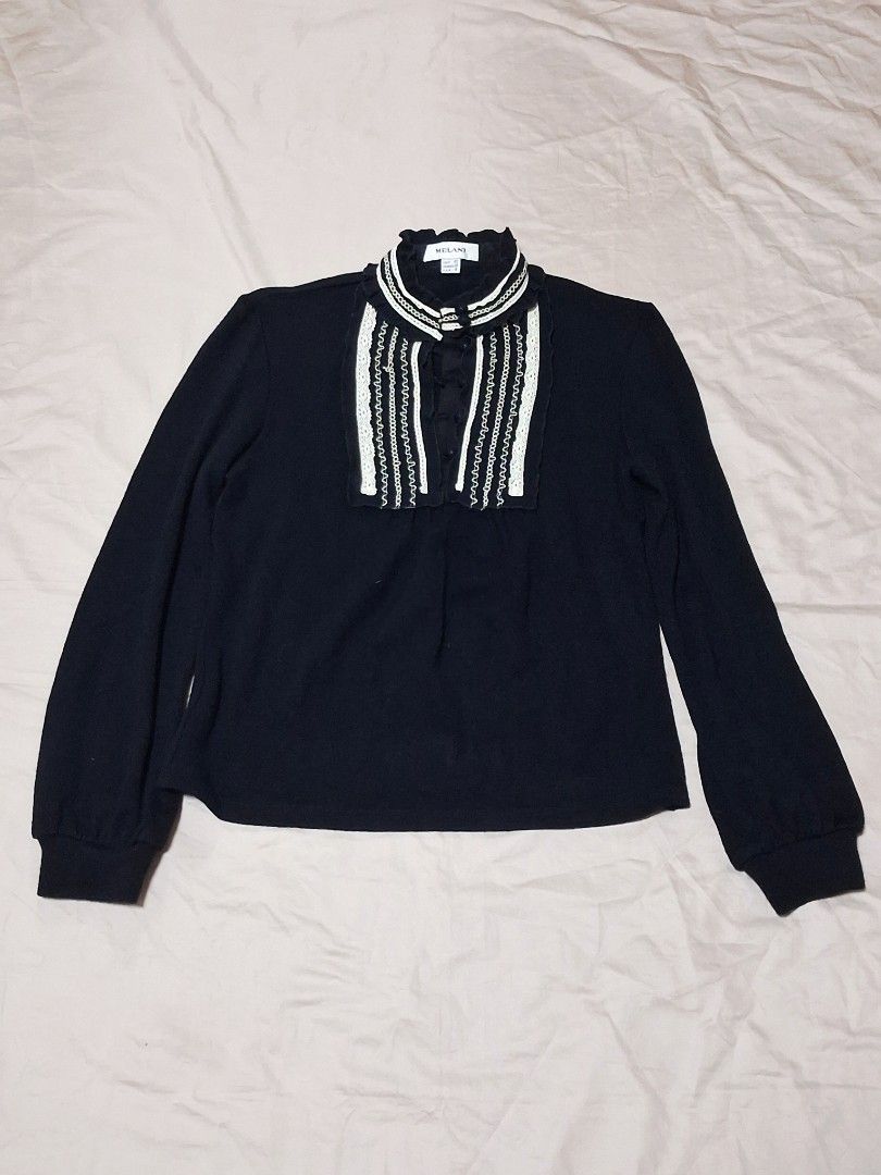 Melani Black Long Sleeve Blouse with Ruffled Collar (Category: Blouses) located in Las Pinas. Submitted by roro_herez (Listing ID 1451665259, Image 1). Description: DECLUTTERING Length: 21.5 Width: 16.5.