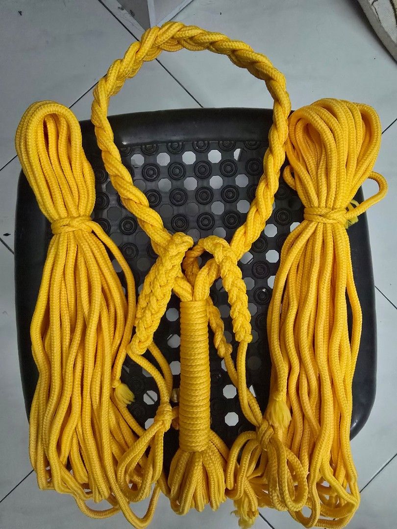 Mongkol Complete Set (Category: Other Sports Equipment and Supplies) located in Melaka Tengah. Submitted by luke_james96 (Listing ID 1451633521, Image 1). Description: complete set Yellow Gold Mongkol, Prajiad and kard Chuek - Thick, braided yellow rope - Neatly finished ends for a clean look. - Suitable for fighters or collectors.