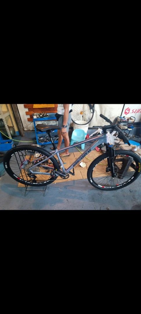 Mountainpeak Mountain Bike - Shimano Deore (Category: Bicycles) located in Quezon City. Submitted by merchantjosh (Listing ID 1451644274, Image 2). Description: - Mountainpeak mountain bike - Equipped with Shimano Deore derailleur - Features Maxxis tires - Perfect for trail adventures and off-road riding - Shows minor scuffs from normal use - Message for more details - 2 Brand New Interior Tires included, Front light, rear light, mud guard, and t