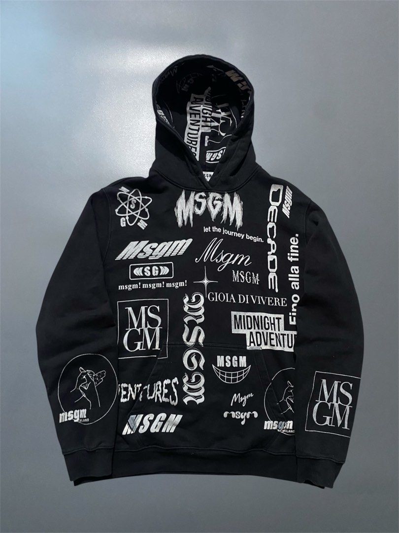 MSGM Black Graphic Print Hoodie (Category: Coats, Jackets and Outerwear) located in Manila. Submitted by delunakenn94368 (Listing ID 1451607028, Image 1). Description: - Black MSGM hoodie - All-over graphic prints and text designs - Features MSGM logo - Drawstring hood - Front pocket - Made in Italy - Perfect statement piece.