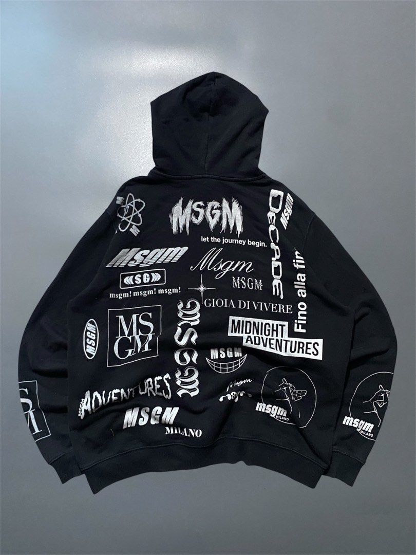 MSGM Black Graphic Print Hoodie (Category: Coats, Jackets and Outerwear) located in Manila. Submitted by delunakenn94368 (Listing ID 1451607028, Image 2). Description: - Black MSGM hoodie - All-over graphic prints and text designs - Features MSGM logo - Drawstring hood - Front pocket - Made in Italy - Perfect statement piece.