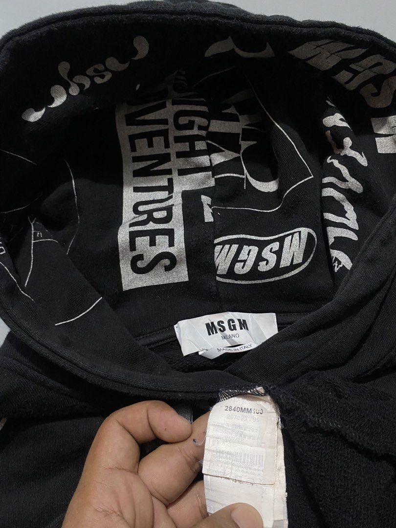 MSGM Black Graphic Print Hoodie (Category: Coats, Jackets and Outerwear) located in Manila. Submitted by delunakenn94368 (Listing ID 1451607028, Image 3). Description: - Black MSGM hoodie - All-over graphic prints and text designs - Features MSGM logo - Drawstring hood - Front pocket - Made in Italy - Perfect statement piece.