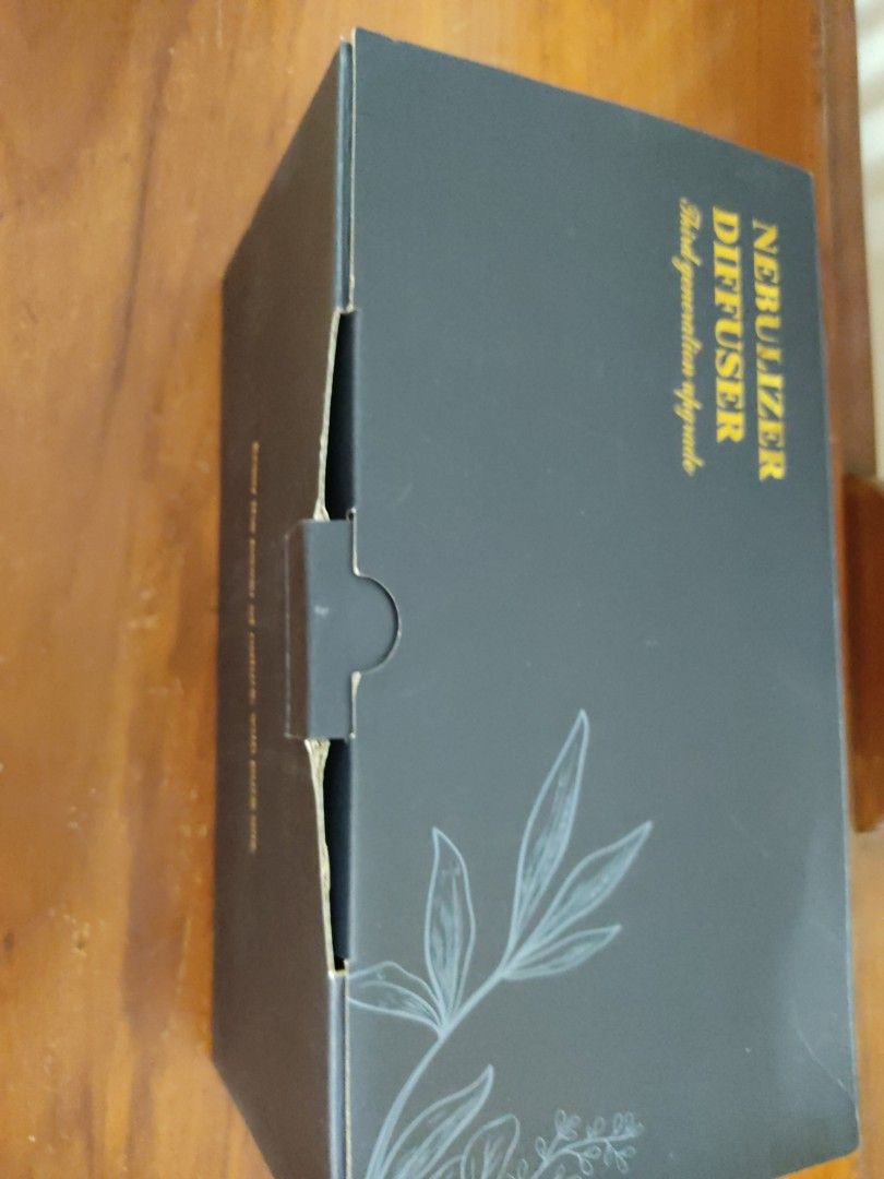 Nebulizer Diffuser - Third Generation Upgrade (Category: Home Fragrance) located in Singapore. Submitted by jack_pow (Listing ID 1451545227, Image 2). Description: - Brand New (Never Used) decluttering space -Selling very cheap $10 Pick up ONLY from my block - 3rd Generation Essential Oil Diffuser - Premium Wooden Top & Glass Bottle - Includes Original Box & Manual - Simple & Effective Aromatherapy - Easy to Use Pick up ONLY from my block .