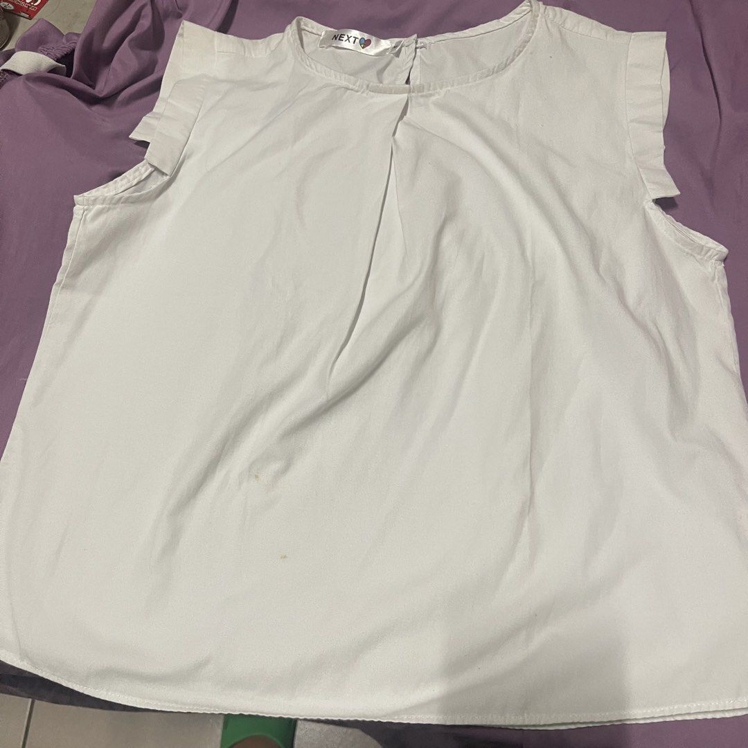 NEXT Jeans White Sleeveless Top Size M (Category: Blouses) located in Manila. Submitted by gomdobear (Listing ID 1451614350, Image 3). Description: - used once - last price already rfs: doesnt fit me anymkre.