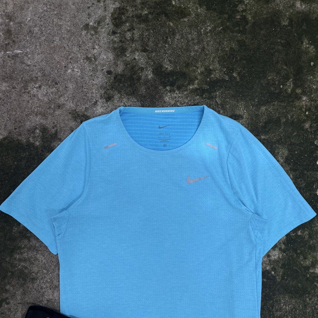 Nike Running Dri-FIT T-Shirt - Blue (Category: Activewear) located in Minglanilla. Submitted by starrmoonn (Listing ID 1451553949, Image 3). Description: Nike Running Shirt Dimes: 20 x 26 front 28 back Condition: 10/10 Color Rate: 10/10 Issue: None Price + Sf!💸.