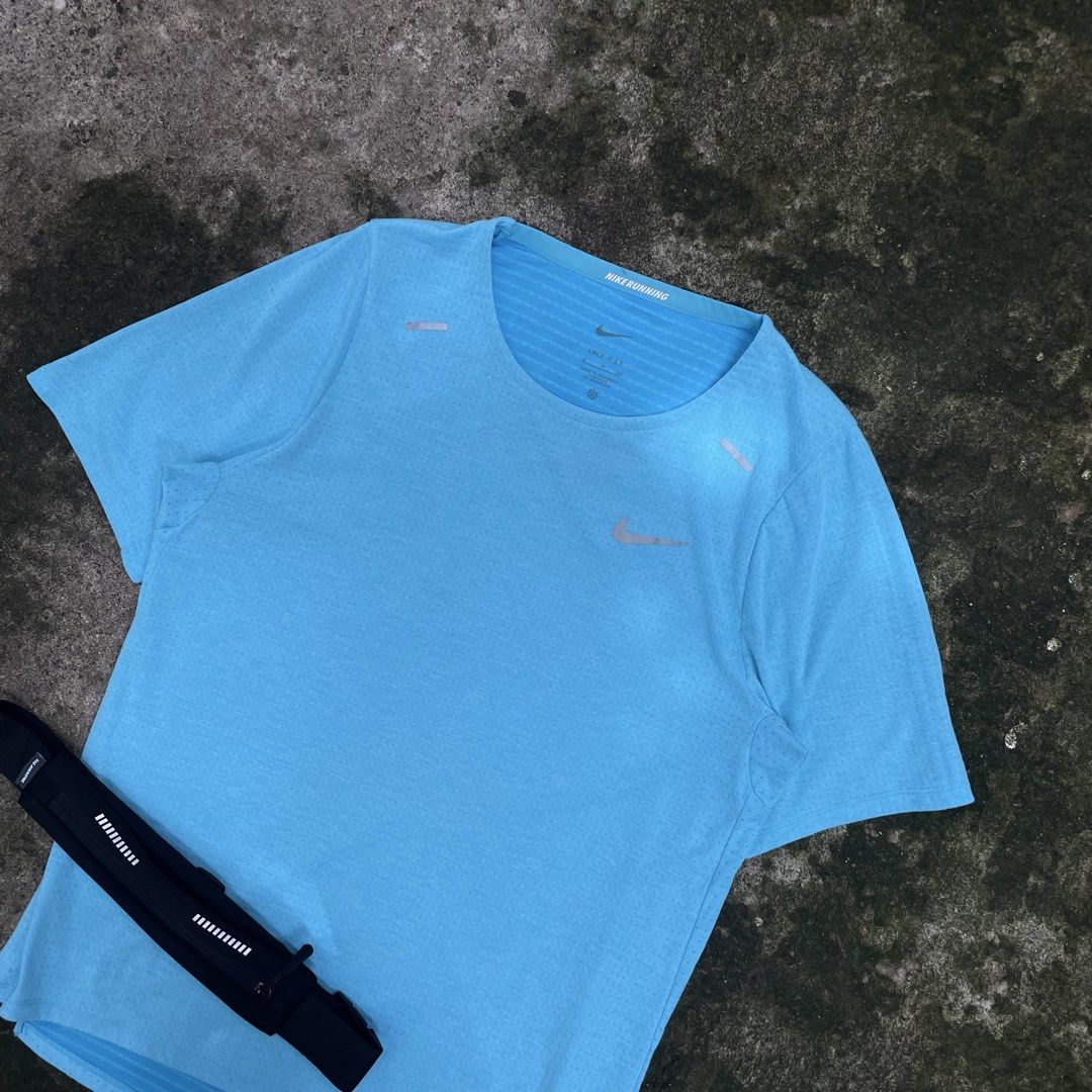 Nike Running Dri-FIT T-Shirt - Blue (Category: Activewear) located in Minglanilla. Submitted by starrmoonn (Listing ID 1451553949, Image 1). Description: Nike Running Shirt Dimes: 20 x 26 front 28 back Condition: 10/10 Color Rate: 10/10 Issue: None Price + Sf!💸.