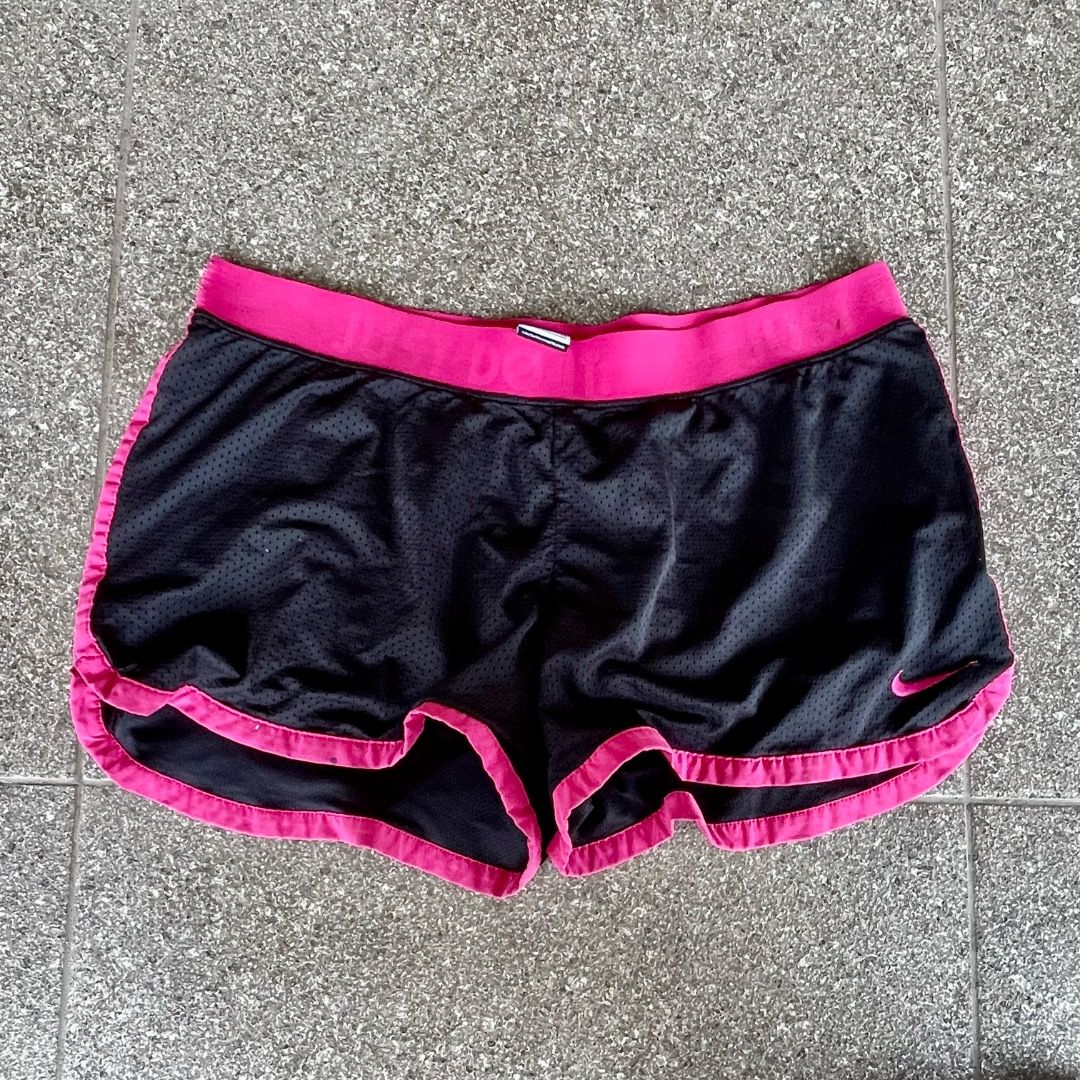 Nike Running Shorts Black Pink Just Do It (Category: Activewear) located in Baguio. Submitted by randomly2600 (Listing ID 1451682840, Image 1). Description: - Black Nike running shorts - Pink trim and waistband - Features 'Just Do It' slogan - Lightweight and breathable material - Perfect for workouts or casual wear.