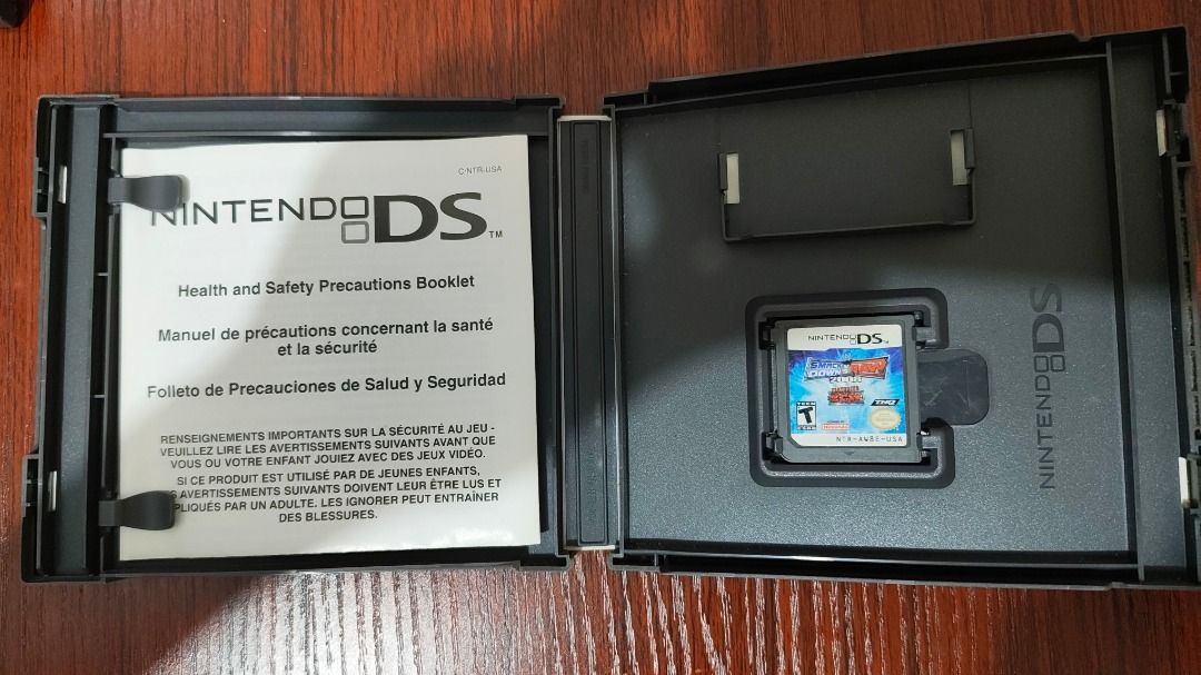 [Nintendo DS, CIB] WWE SmackDown vs. Raw 2008 (Category: Nintendo) located in Castillejos. Submitted by 2ndhandgamer (Listing ID 1451652121, Image 3). Description: One of the worst games I played on the Nintendo DS. It's a wrestling game controlled entirely through the touchscreen. It has a pretty sizable roster of playable wrestlers from SmackDown, Raw, and ECW. But the moveset is so laughably limited. Please buy it..