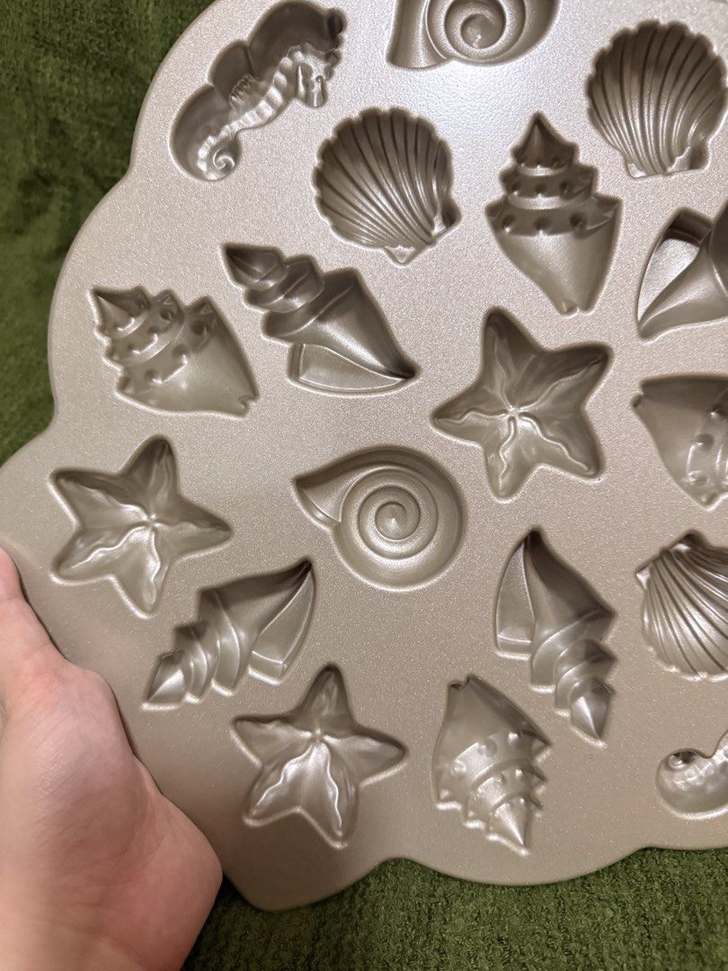 Nordic Ware Seashell and Starfish Shaped Pan (Category: Bakeware) located in Manila. Submitted by georgethjafine (Listing ID 1451686932, Image 2). Description: There are 4 pieces in total = 5k (TAKE ALL 4) It’s 1,700 for one piece (you save 1,800 if you take all 4).