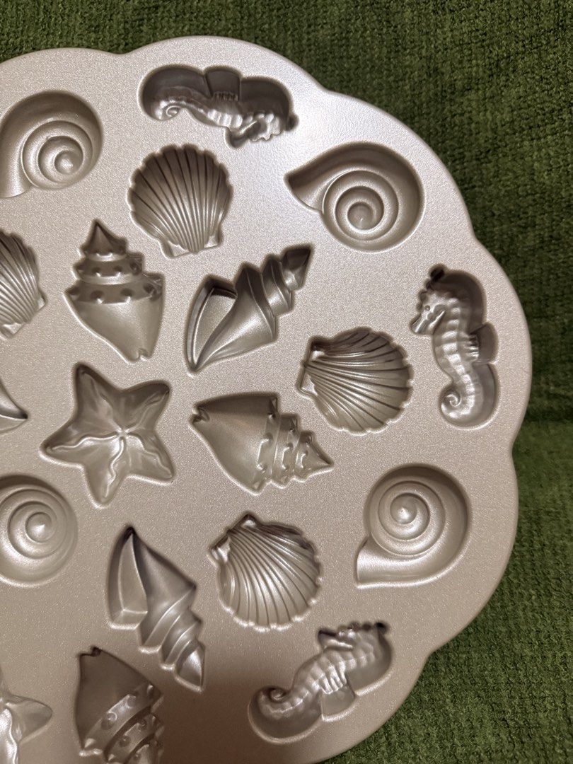 Nordic Ware Seashell and Starfish Shaped Pan (Category: Bakeware) located in Manila. Submitted by georgethjafine (Listing ID 1451686932, Image 3). Description: There are 4 pieces in total = 5k (TAKE ALL 4) It’s 1,700 for one piece (you save 1,800 if you take all 4).