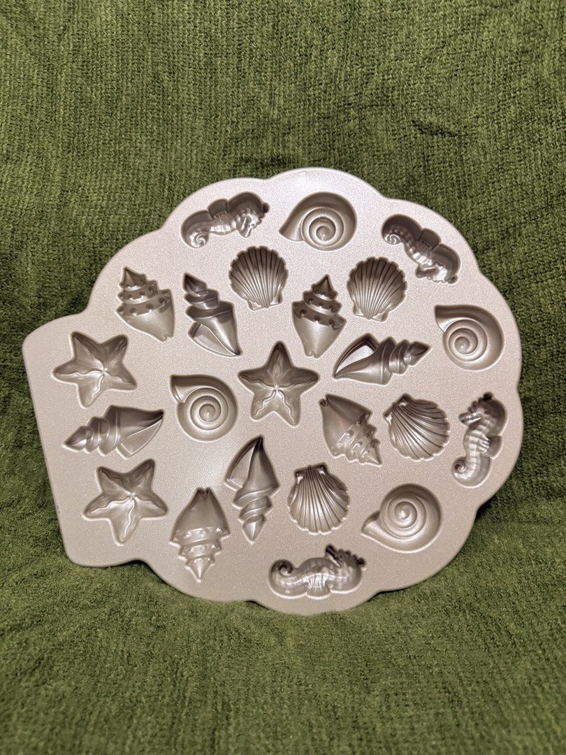 Nordic Ware Seashell and Starfish Shaped Pan (Category: Bakeware) located in Manila. Submitted by georgethjafine (Listing ID 1451686932, Image 1). Description: There are 4 pieces in total = 5k (TAKE ALL 4) It’s 1,700 for one piece (you save 1,800 if you take all 4).