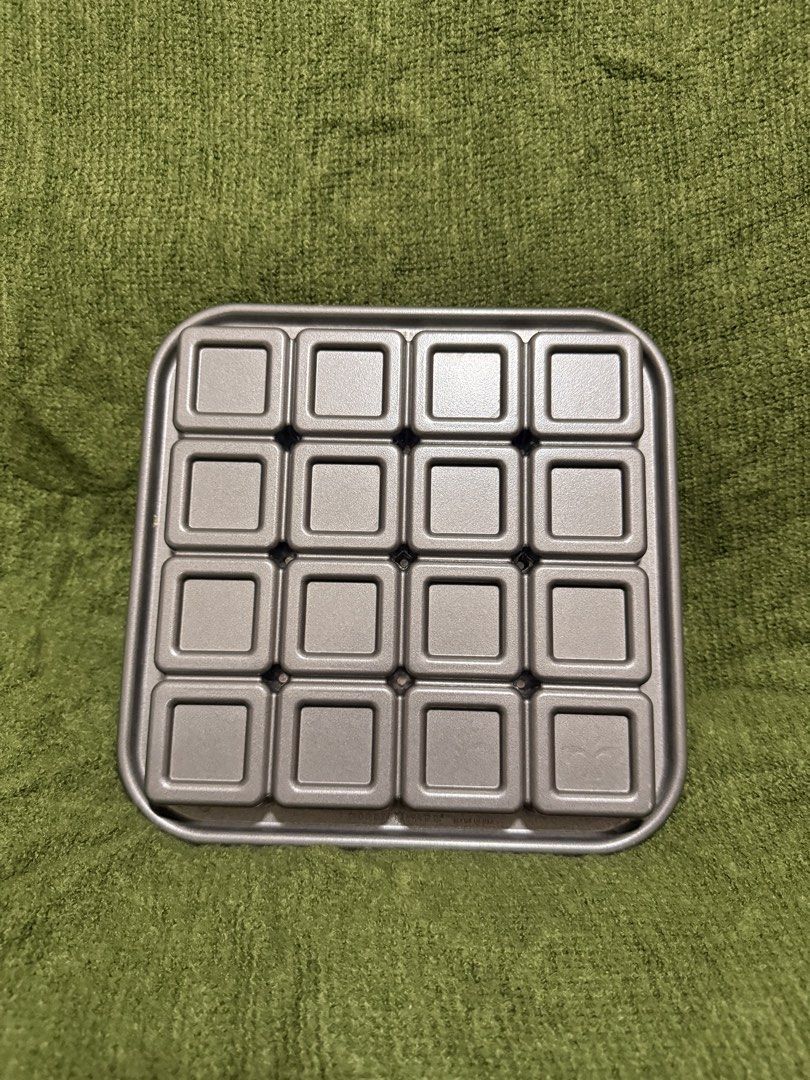Nordic Ware (Square Pan Mold) (Category: Bakeware) located in Manila. Submitted by georgethjafine (Listing ID 1451687541, Image 2). Description: THERE ARE 8 PIECES IN TOTAL = 8K TAKE ALL 5,500 for 4 PIECES 1,800 FOR ONLY ONE PIECE - Nordic Ware Brownie Bites Pan - Makes 16 individual square brownies - Non-stick surface for easy release - Perfect for parties and snacks - Easy to use and clean - Made in USA.