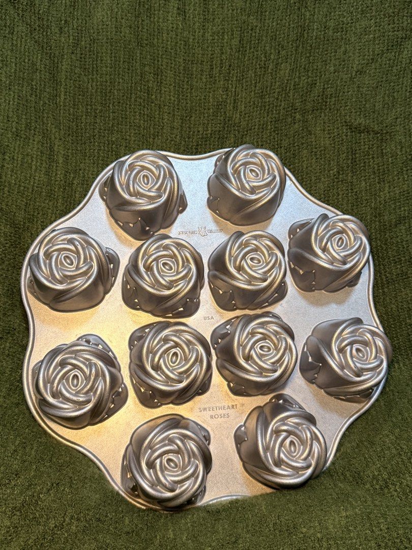 Nordic Ware Sweetheart Roses Pan (Category: Bakeware) located in Manila. Submitted by georgethjafine (Listing ID 1451689031, Image 2). Description: TAKE BOTH FOR 1,500 1000 for ONE PIECE (You’ll save 500 if you get BOTH) - Brand: Nordic Ware - Model: Sweetheart Roses Pan - Design: Features 12 individual rose-shaped molds - Material: Durable, high-quality bakeware material - Condition: Excellent, ready for use - Perfect for: Cakes, cupcakes, mini 
