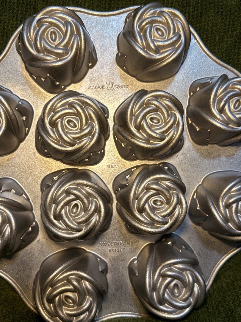 Nordic Ware Sweetheart Roses Pan (Category: Bakeware) located in Manila. Submitted by georgethjafine (Listing ID 1451689031, Image 3). Description: TAKE BOTH FOR 1,500 1000 for ONE PIECE (You’ll save 500 if you get BOTH) - Brand: Nordic Ware - Model: Sweetheart Roses Pan - Design: Features 12 individual rose-shaped molds - Material: Durable, high-quality bakeware material - Condition: Excellent, ready for use - Perfect for: Cakes, cupcakes, mini 