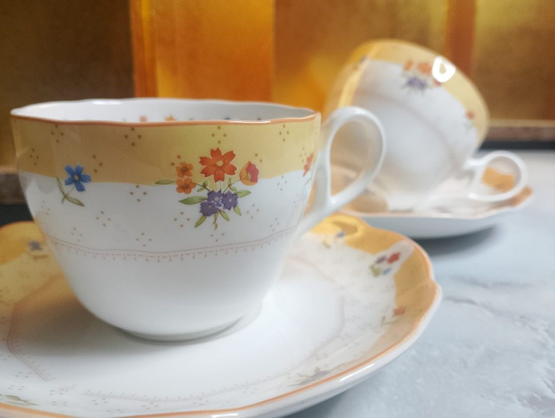 Noritake Earthenware "True Love" Teacup and Saucer Set (Category: Coffee & Tea Tableware) located in Valenzuela. Submitted by buylaaaaa (Listing ID 1451558617, Image 2). Description: - Noritake "True Love" Teacup and Saucer Set - Features a charming yellow band with delicate floral patterns - Microwave, oven, and dishwasher safe for convenience - Crafted with quality in Japan - Ideal for enjoying your morning tea or coffee - 1duo available.