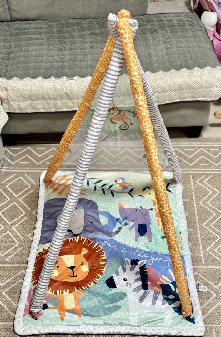 Nuby Baby Play Gym (Category: Infant Playtime) located in Binan City. Submitted by thelittleloop (Listing ID 1451624256, Image 1). Description: - Soft and padded play mat - Overhead arches with giraffe and striped pattern - Ideal for tummy time and sensory development - Easy to fold and store.