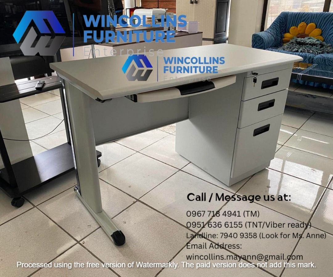 Office Table / Study Table / Work Table / Computer Table (Category: Tables & Sets) located in Manila. Submitted by wincollinsmayannrc (Listing ID 1451527581, Image 2). Description: Office Table / Study Table / Work Table Melamine scratch proof table top with metal body pull out side drawers with lock, keyboard tray Color: Light gray Size: 120cmLx60cmDx76H.