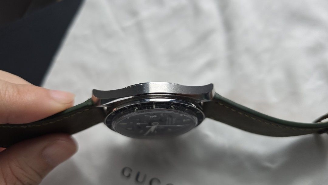 Omega Speedmaster "The First Watch on the Moon" (Category: Luxury Watches) located in Muntinlupa City. Submitted by closetraids (Listing ID 1451698541, Image 3). Description: Send your best offer. No lowballers. 100% authentic or your money back. - Omega Speedmaster "The First Watch on the Moon" - Manual wind chronograph movement - Durable Hesalite crystal - Comes with a stylish brown leather strap with yellow stitching. Original bracelet will al