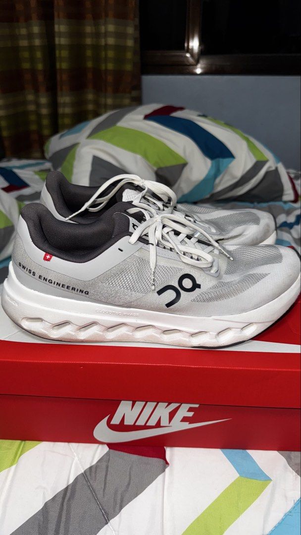 On Running Cloudsurfer Next - "Glacier" (Category: Sneakers) located in Manila. Submitted by yazcg (Listing ID 1451675931, Image 3). Description: On Running - Cloudsurfer Next - "Glacier" - used only for walking and travelling - not used for running - midsole needs cleaning - can be wiped - some stains on toe area and heel area - if shipping - shouldered by buyer - meetups: makati (salcedo, legazpi or glorietta area), sm bicutan, sm bf - no og bo