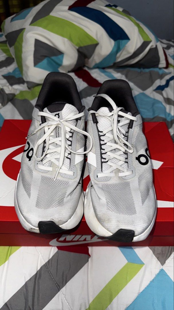 On Running Cloudsurfer Next - "Glacier" (Category: Sneakers) located in Manila. Submitted by yazcg (Listing ID 1451675931, Image 2). Description: On Running - Cloudsurfer Next - "Glacier" - used only for walking and travelling - not used for running - midsole needs cleaning - can be wiped - some stains on toe area and heel area - if shipping - shouldered by buyer - meetups: makati (salcedo, legazpi or glorietta area), sm bicutan, sm bf - no og bo