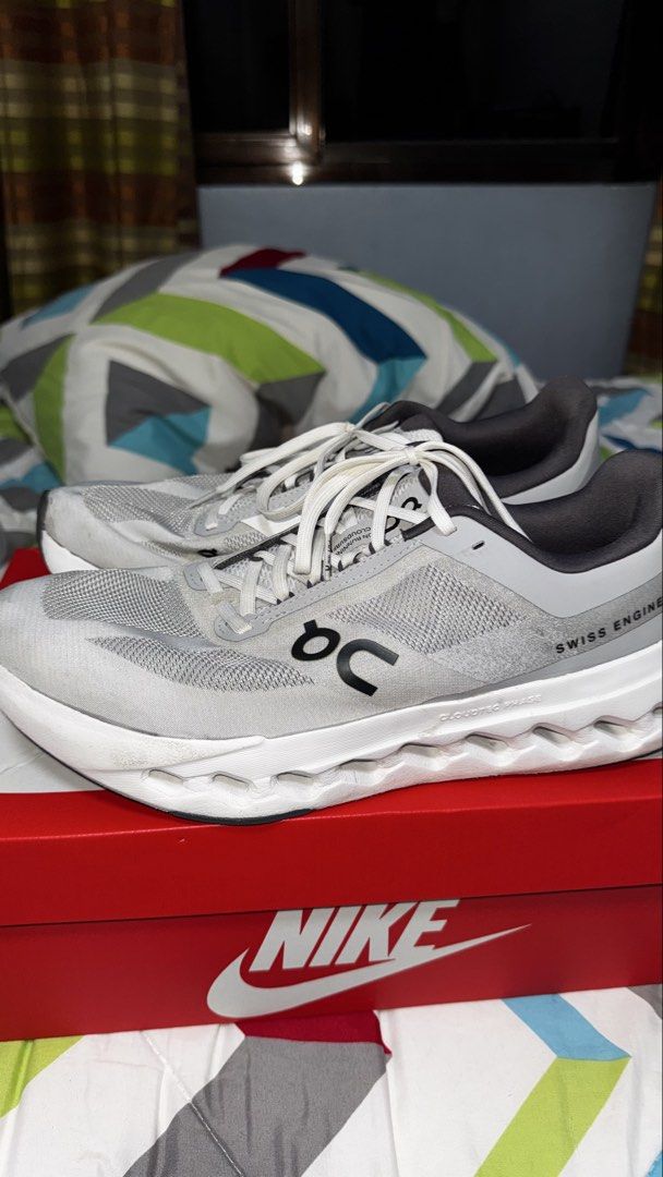 On Running Cloudsurfer Next - "Glacier" (Category: Sneakers) located in Manila. Submitted by yazcg (Listing ID 1451675931, Image 1). Description: On Running - Cloudsurfer Next - "Glacier" - used only for walking and travelling - not used for running - midsole needs cleaning - can be wiped - some stains on toe area and heel area - if shipping - shouldered by buyer - meetups: makati (salcedo, legazpi or glorietta area), sm bicutan, sm bf - no og bo