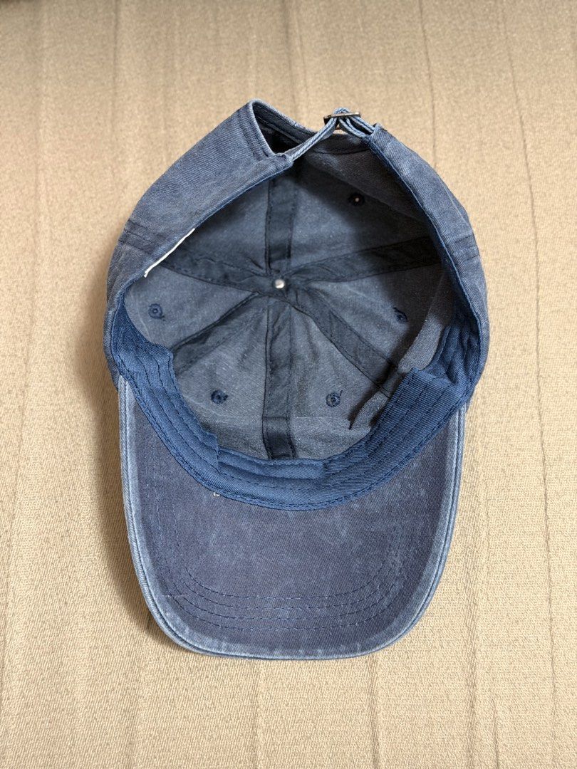 Plain Navy Blue Faded Baseball Cap (Category: Caps & Hats) located in Binan City. Submitted by ishnaaa (Listing ID 1451594182, Image 2). Description: - Like new - No flaws (faded talaga yung color when I bought it :) ) - Delivery via lalamove, sf c/o buyer.
