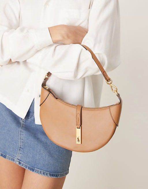 Polo Ralph Lauren Saddle Bag Tan Leather (Category: Luxury Bags & Wallets) located in Manila. Submitted by ella1222 (Listing ID 1451537049, Image 3). Description: - Authentic Polo Ralph Lauren saddle bag - Color: Tan leather - Condition: Worn only twice, with tags still attached - Includes: Original dust bag, shopping bag, and tags - Versatile: Ideal for everyday use or special occasions -Negotiable.
