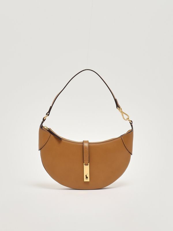 Polo Ralph Lauren Saddle Bag Tan Leather (Category: Luxury Bags & Wallets) located in Manila. Submitted by ella1222 (Listing ID 1451537049, Image 2). Description: - Authentic Polo Ralph Lauren saddle bag - Color: Tan leather - Condition: Worn only twice, with tags still attached - Includes: Original dust bag, shopping bag, and tags - Versatile: Ideal for everyday use or special occasions -Negotiable.