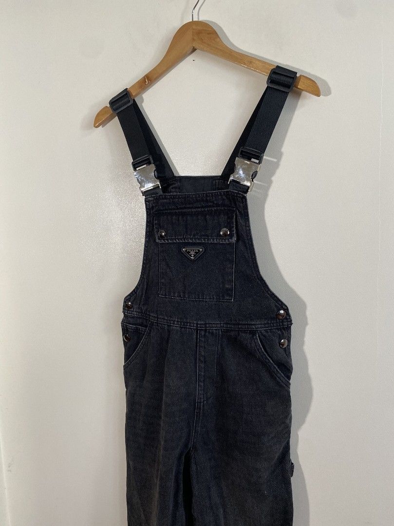 Prada Dark Wash Dungaree Jumpsuit (Category: Coats, Jackets and Outerwear) located in Abucay. Submitted by jamesnike21 (Listing ID 1451585508, Image 2). Description: 📌Prada Overalls "Unisex" 📌excellent condition 📌size small on tag 📌Slightly wrinkled due to storage 👍 📌The color of the product may differ from actual color depending on the type, condition of the display, surrounding light and other factors. 👍 📌For negotiations, send offer 👍