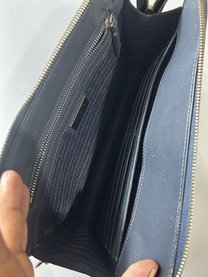 Prada Wrislet (Category: Luxury Bags & Wallets) located in Aurora. Submitted by purethrift07 (Listing ID 1451678208, Image 3). Description: Maganda to Kayo nalang pa gawa nito Authentic Dm me.