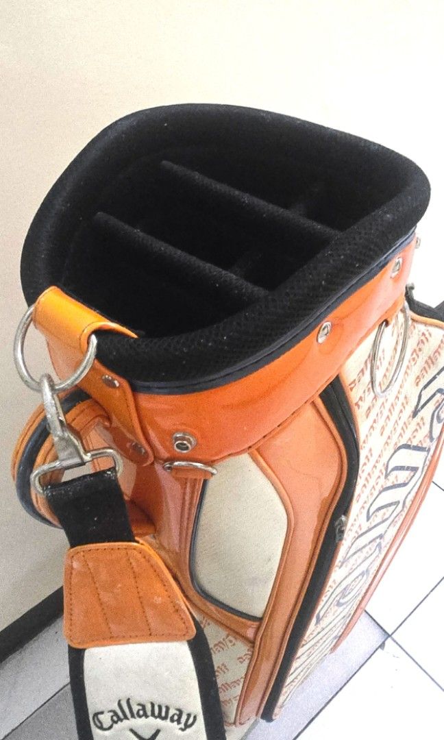 [REPRICED] Pre-loved Callaway Golf Bag (Category: Golf) located in Manila. Submitted by nikkora (Listing ID 1451681032, Image 2). Description: 📍Callaway orange & white leather caddie bag - Well-used - Rare color combination - All zippers are functional - Comes with detachable cover/cap (as seen in photos) - Full disclosure: White leather on upper portion is peeling ("nagbabalat") 📍Shipping info: - Price excludes shipping fee - Comes with box (b