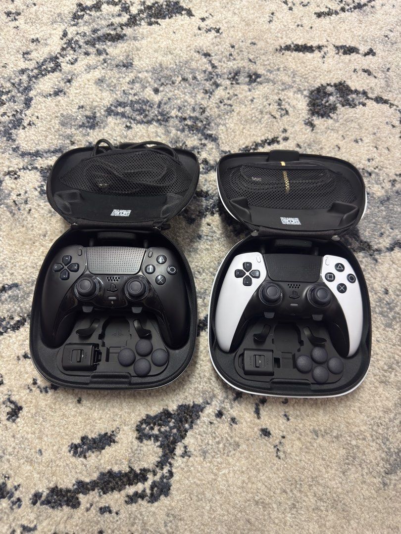 PS5 DualSense Edge controllers (white and midnight black) + cases and accessories (Category: Controllers) located in Pasig City. Submitted by robbiseraphin (Listing ID 1451635211, Image 1). Description: 🎮 Selling: PS5 Dualsense Edge controller white edition + case and accessories. No box 💰 For only 8000 php nalang! 🎮 Selling: PS5 Dualsense Edge controller white edition + case and accessories. No box 💰 For only 8000 php nalang! 📍 Items are in