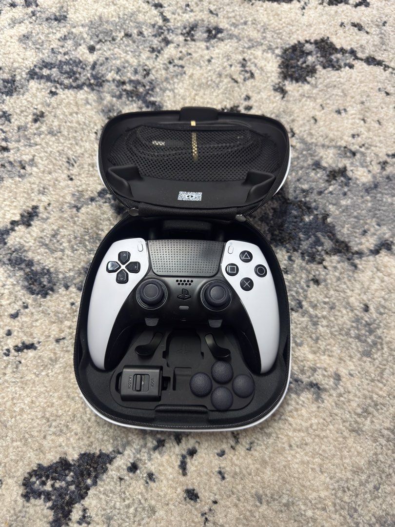 PS5 DualSense Edge controllers (white and midnight black) + cases and accessories (Category: Controllers) located in Pasig City. Submitted by robbiseraphin (Listing ID 1451635211, Image 3). Description: 🎮 Selling: PS5 Dualsense Edge controller white edition + case and accessories. No box 💰 For only 8000 php nalang! 🎮 Selling: PS5 Dualsense Edge controller white edition + case and accessories. No box 💰 For only 8000 php nalang! 📍 Items are in