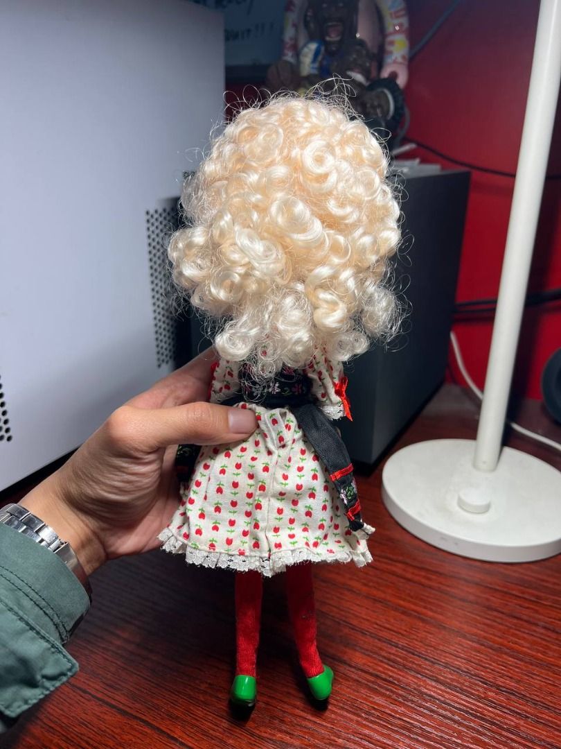Pullip Dal-Colline (Category: Figurines & Statues) located in Baguio. Submitted by ditoyzb08176 (Listing ID 1451649628, Image 2). Description: - Adorable doll with blonde curly hair and striking red eyes. - Dressed in a charming traditional folk-style floral dress. - Features a black apron over a white blouse with red trim. - Comes with red tights and green shoes. - Neck has manufacturer markings. Location: Baguio City Shipping: J&T/FLASH/LBC .