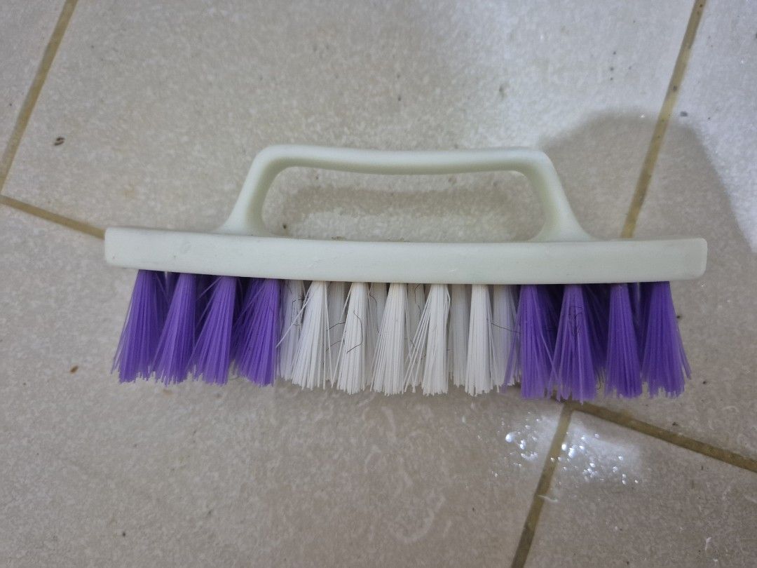 Purple and White Bristle Cleaning Brush with Handle (Category: Hair) located in Manila. Submitted by zotag (Listing ID 1451645807, Image 1). Description: - Sturdy scrubbing brush for tough jobs. - Firm bristles effectively clean floors and surfaces. - Comfortable white handle for easy grip and use. - Attractive purple and white bristle design..