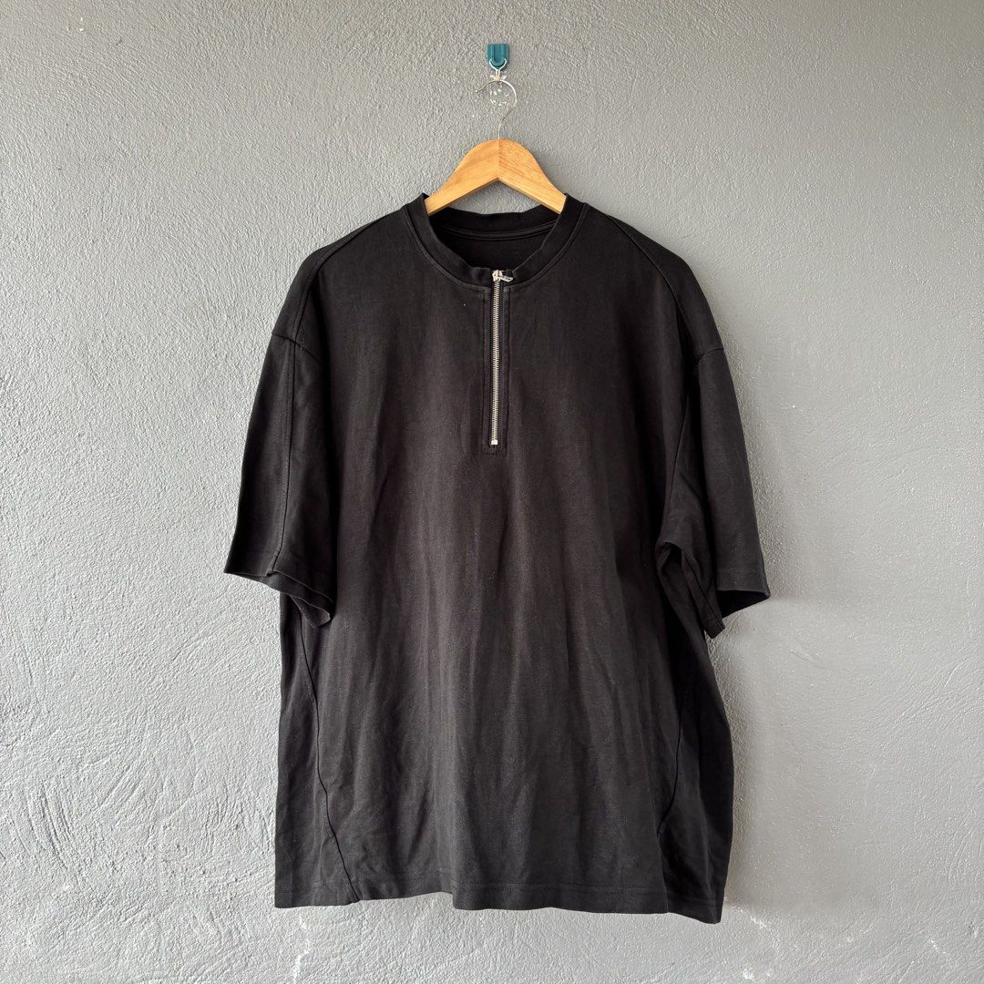 Quarter zip polo (Category: Tshirts & Polo Shirts ) located in San Fernando. Submitted by diff.thr1ft (Listing ID 1451532780, Image 1). Description: - Brand: See Also - Type: Quarter Zip Polo Shirt - Color: Black - Size: M on tag fit large - Features: Modern quarter zip neckline - Style: Casual, versatile.