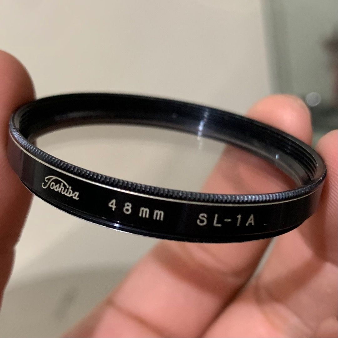 Rare camera lens filters (Category: Cameras) located in Manila. Submitted by gepmacadaeg (Listing ID 1451693086, Image 2). Description: Sold as set only. - Canon 48mm UV - Toshiba 48mm SL-1A - Olympus 43.5mm SL39.5C - Konica Konifilter 49mm UV - no brand 35.5mm UV.