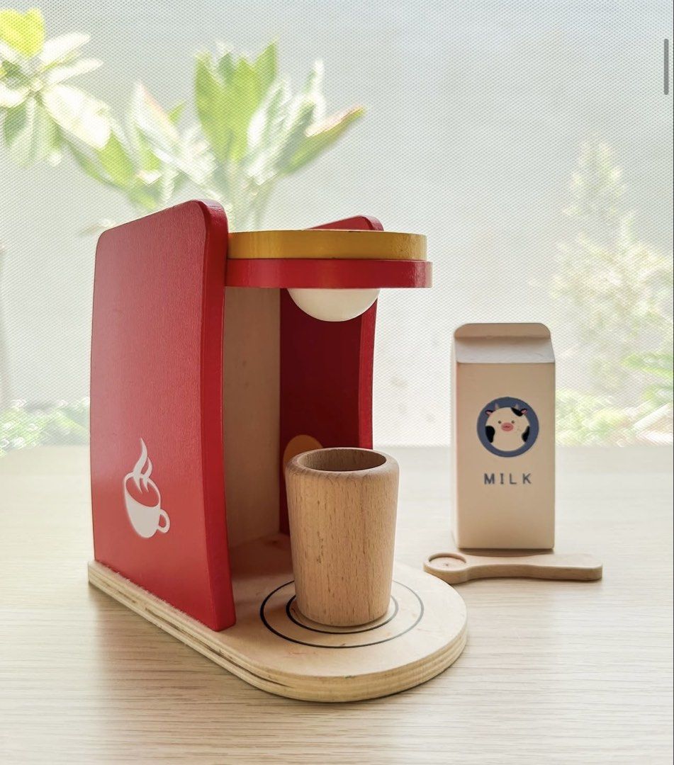 Rare Wooden Coffee Maker Toy (Category: Coffee Machines & Makers) located in Quezon City. Submitted by cosm1c (Listing ID 1451613584, Image 1). Description: - Adorable wooden toy coffee maker set. - Set includes: coffee machine, wooden cup, and spoon. - Encourages imaginative and pretend play. - Made from durable wood with red and natural finishes..