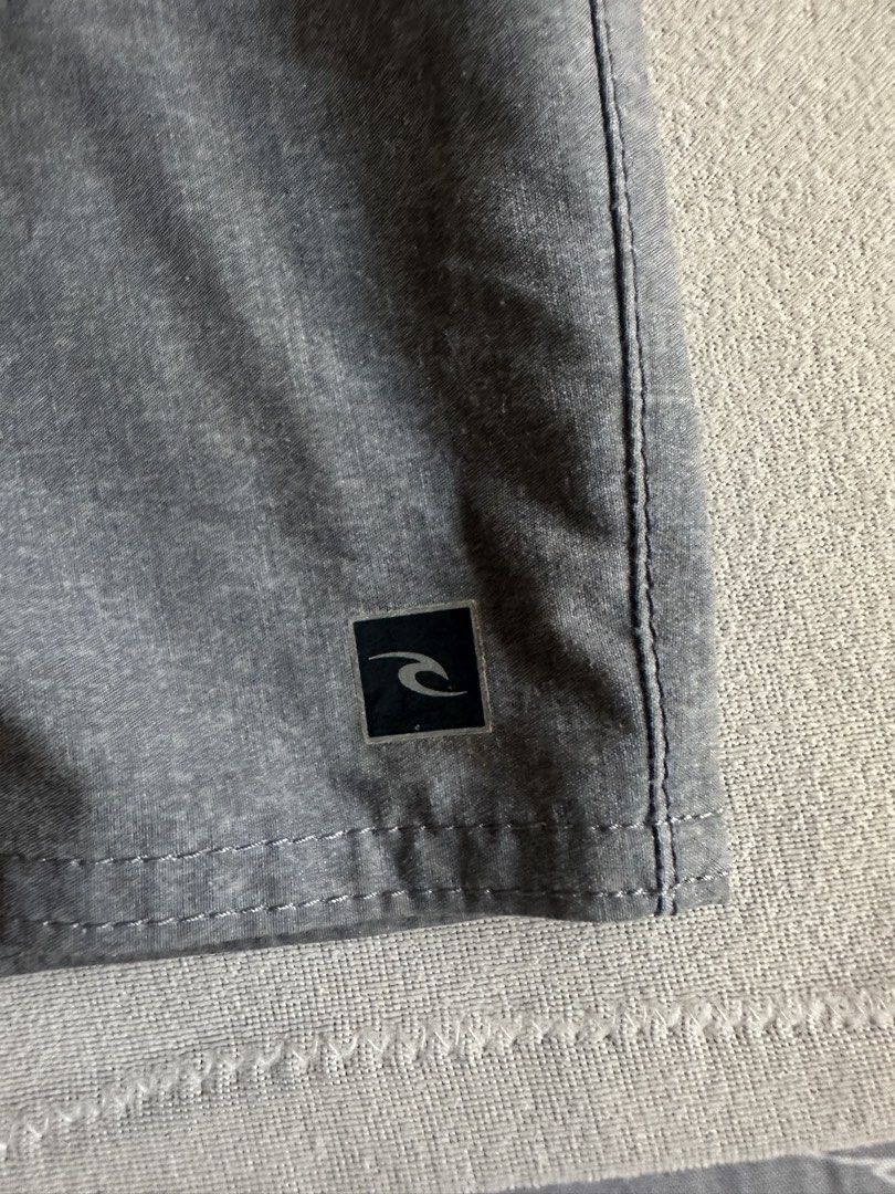 RipCurl Swimming Board Shorts for Men (Category: Swim Trunks & Board Shorts) located in Aroroy. Submitted by nicadeclutterz (Listing ID 1451667466, Image 2). Description: • RIP CURL SHORTS FOR MEN - original - lightly used only - in good condition - size 32 - colors may appear lighter or darker due to lighting - manage expectations as this item is preloved - dm for more details ☺️ dimes: length: 17.5 inches width: 17 inches waist: 80 cm 💰MOP: GC