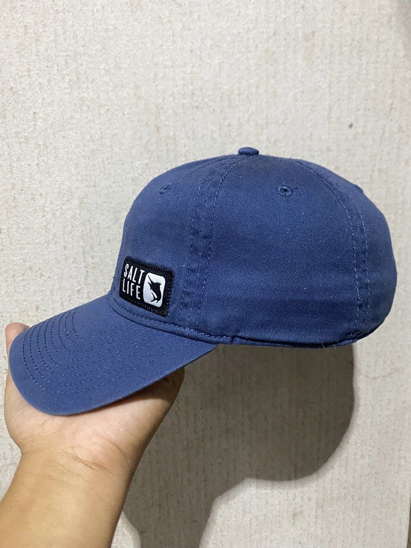Salt Life Blue Baseball Cap Fishing Hat (Category: Caps & Hats) located in Puerto Princesa. Submitted by earlpogitrhift (Listing ID 1451540949, Image 2). Description: - Blue Salt Life cap - Features iconic Salt Life logo patch on the front - Adjustable strap for a customized fit - Perfect for sunny days and casual wear - Shows minimal signs of wear.