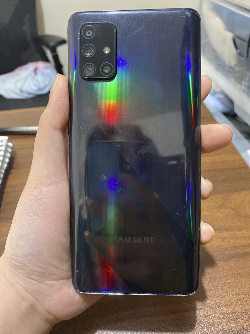 Samsung Galaxy A71 (Category: Samsung) located in Manila. Submitted by nicolezald25729 (Listing ID 1451568093, Image 2). Description: 📱 FOR SALE: Samsung Galaxy A71 — ✨ Samsung Galaxy A71 | 128GB | Dual SIM 📌 Condition/Issue: • Tempered glass is cracked and needs replacement. • There is one tiny crack at the top of the screen, but it does not affect the phone’s performance or functionality. • Please see photos for the actual condition. •Unli re