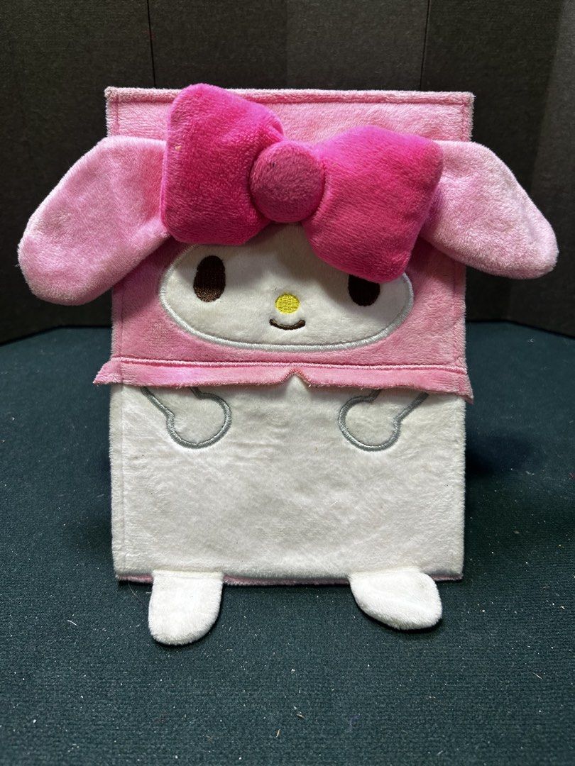 Sanrio My Melody Plush Folding Mirror (Category: Mirrors) located in Manila. Submitted by starbalesukandjapansurplus (Listing ID 1451554235, Image 1). Description: - Adorable My Melody folding mirror - Soft plush exterior with signature pink bow and ears - Opens to reveal a mirror for makeup touch-ups - Folds flat for convenient storage - A must-have for any Sanrio collector!.